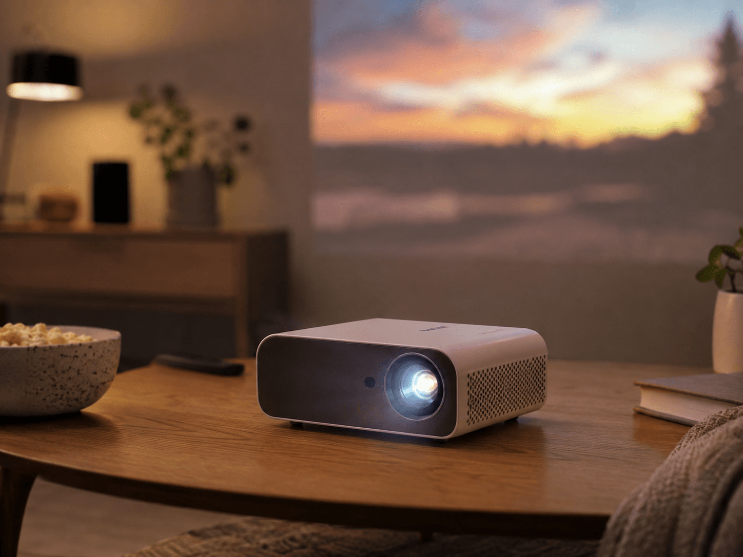 Compact projector set up for a cosy movie night